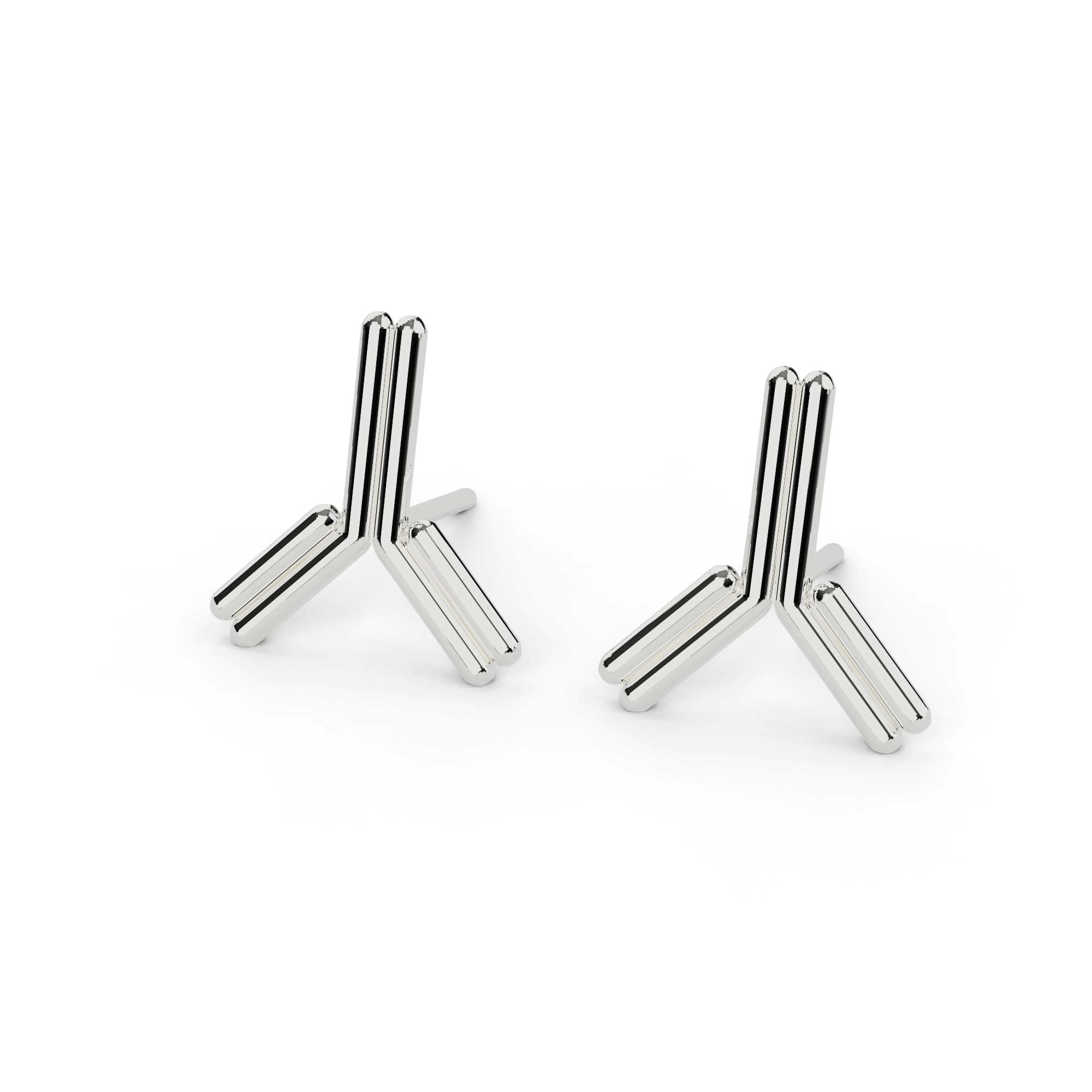 Close-up of silver antibody stud earrings shaped like Y-shaped immunoglobulins – perfect science jewelry for immunologists and med students. Close-up of silver antibody stud earrings shaped like Y-shaped immunoglobulins – perfect science jewelry for immunologists and med students.