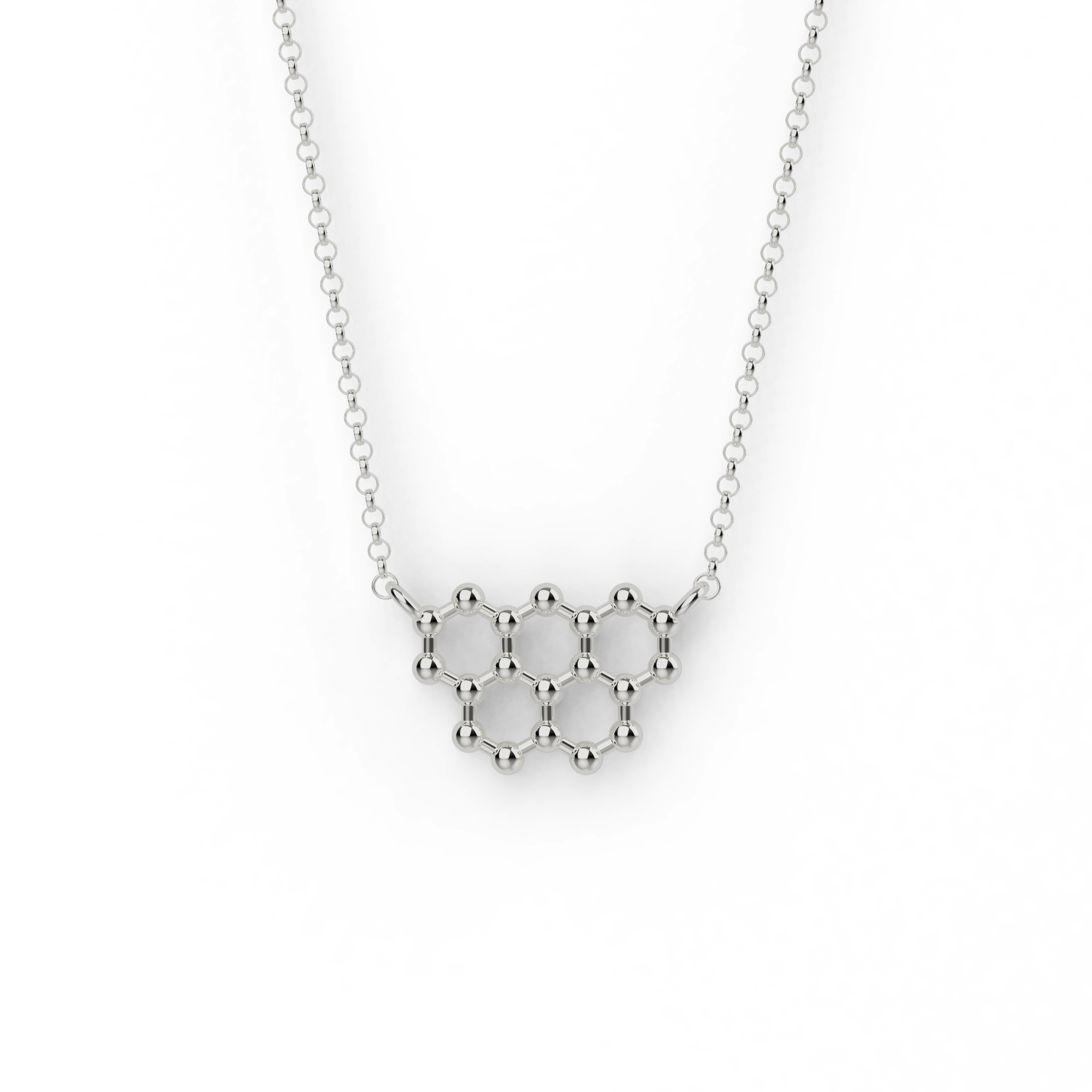 Close-up of a graphite necklace in sterling silver, designed with a hexagonal carbon structure, inspired by science and chemistry. Close-up of a graphite necklace in sterling silver, designed with a hexagonal carbon structure, inspired by science and chemistry.