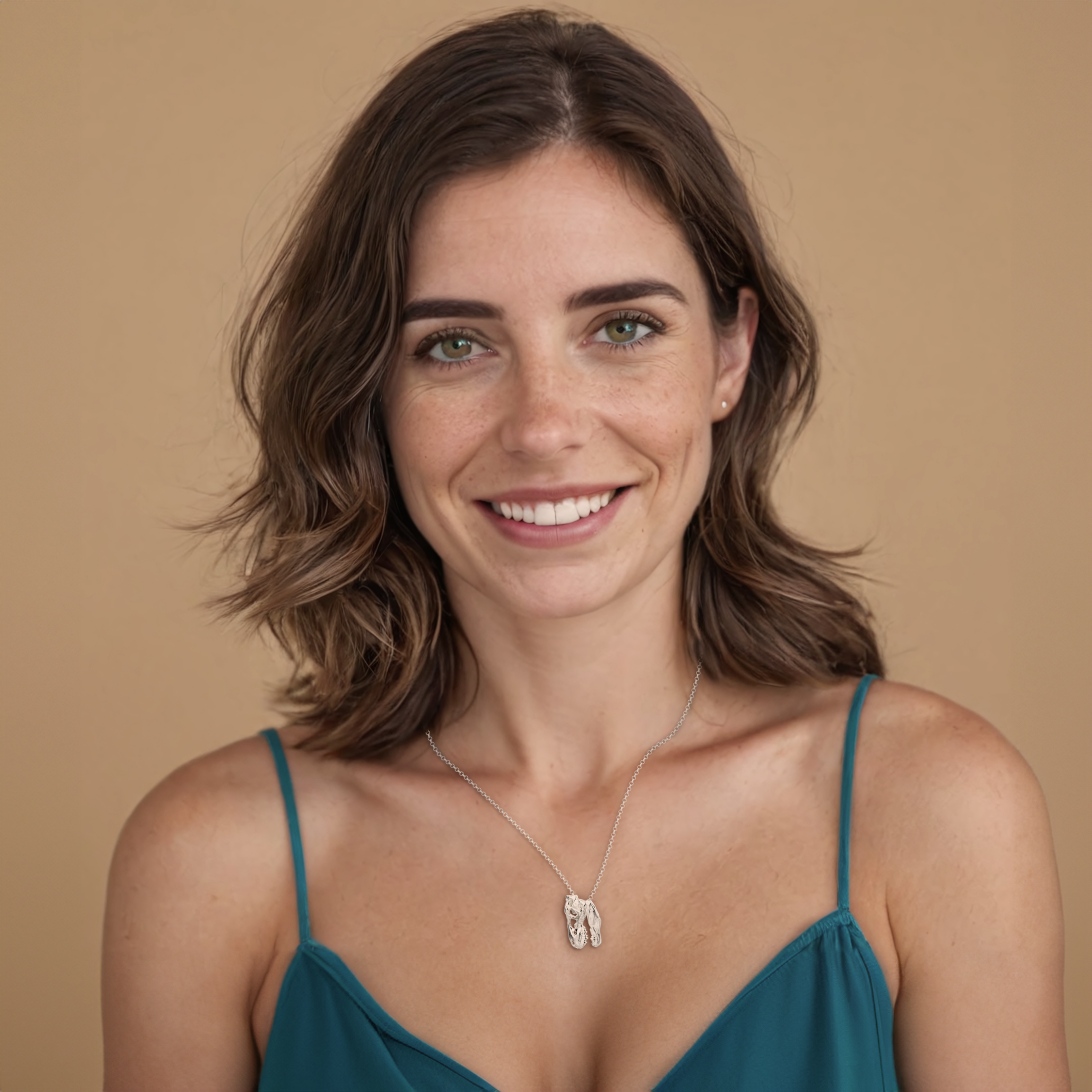Model wearing T-Rex skull necklace. A stylish and science-inspired silver necklace showcasing the skull of the mighty T-Rex. Model wearing T-Rex skull necklace. A stylish and science-inspired silver necklace showcasing the skull of the mighty T-Rex.