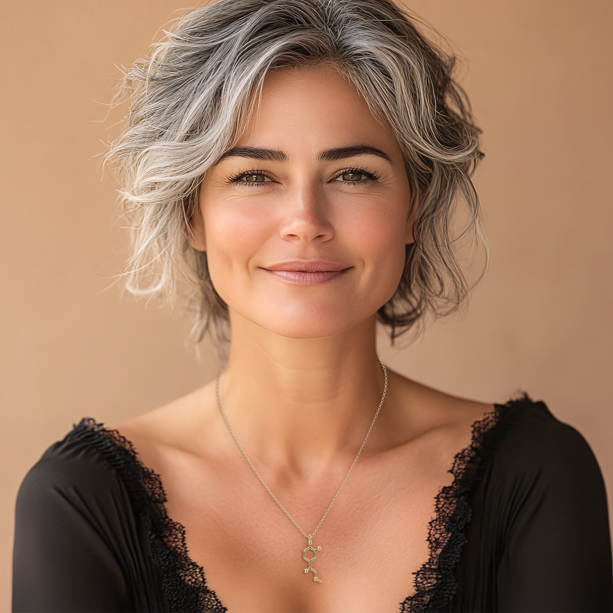 Woman wearing the gold vermeil adrenaline necklace, showcasing its length and how it drapes elegantly on the neckline. Woman wearing the gold vermeil adrenaline necklace, showcasing its length and how it drapes elegantly on the neckline.