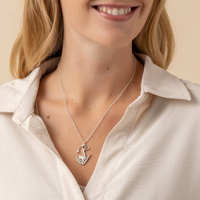Cardiac conduction system necklace in sterling silver, showcasing the heart’s electric pathway design. Cardiac conduction system necklace in sterling silver, showcasing the heart’s electric pathway design.