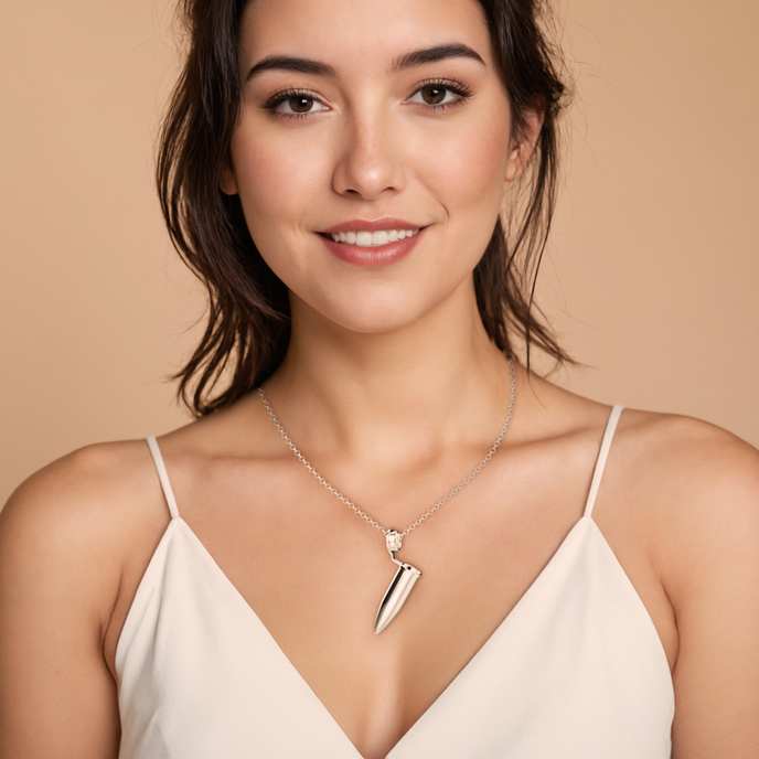 Woman wearing the Eppendorf Necklace, highlighting its chic design and scientific inspiration. Woman wearing the Eppendorf Necklace, highlighting its chic design and scientific inspiration.