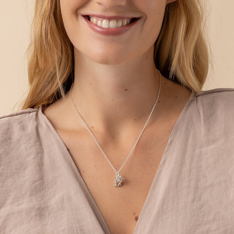 Insulin necklace worn by a model, perfect for diabetics, doctors, and science enthusiasts. Insulin necklace worn by a model, perfect for diabetics, doctors, and science enthusiasts.