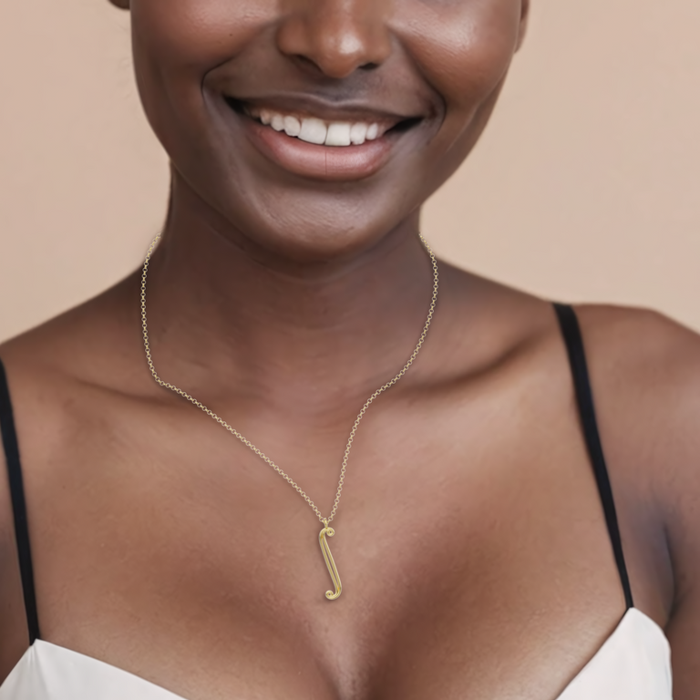 Close-up of the integral necklace on a woman’s neck – A delicate, math-inspired gold necklace featuring the integral symbol, ideal for STEM enthusiasts. Close-up of the integral necklace on a woman’s neck – A delicate, math-inspired gold necklace featuring the integral symbol, ideal for STEM enthusiasts.