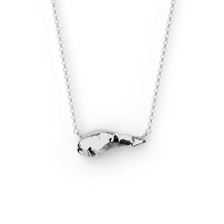 Close-up of silver pancreas necklace – a unique science-inspired jewelry piece. Close-up of silver pancreas necklace – a unique science-inspired jewelry piece.