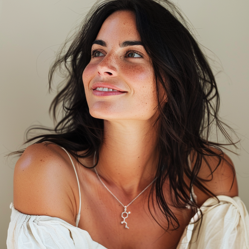 Adrenaline necklace worn by model, highlighting the molecular design in sterling silver Adrenaline necklace worn by model, highlighting the molecular design in sterling silver