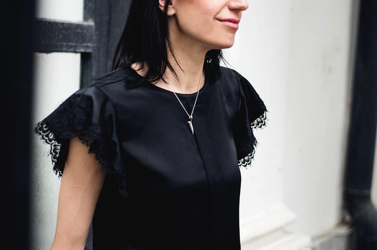 Eppendorf Necklace styled as a unique science-inspired fashion statement. Eppendorf Necklace styled as a unique science-inspired fashion statement.