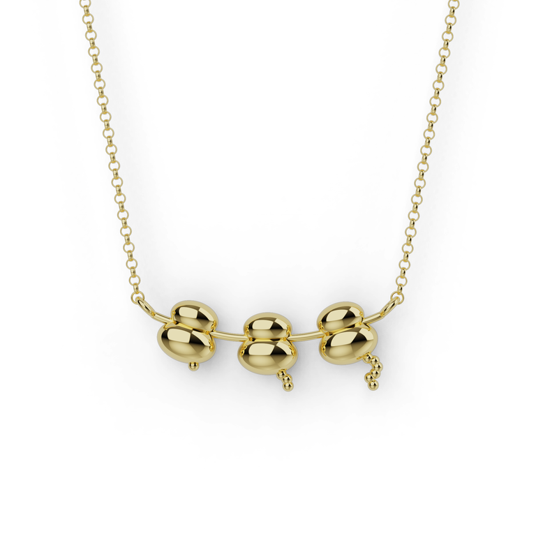 Gold vermeil ribosomes necklace with elegant pendant inspired by cellular protein factories.