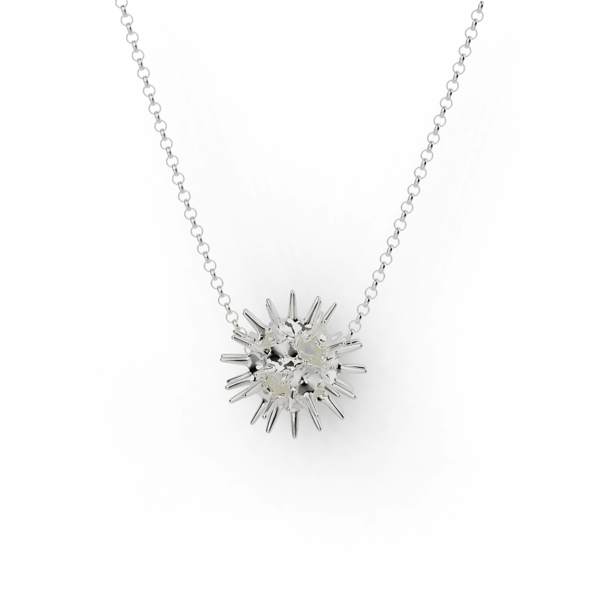 Close-up of a silver pollen grain necklace, showcasing its intricate design inspired by plant biology.