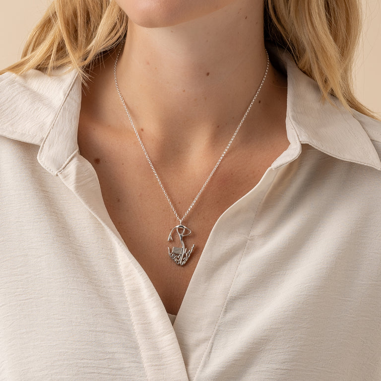 Side view of the cardiac conduction system necklace in silver, showing intricate anatomical details.