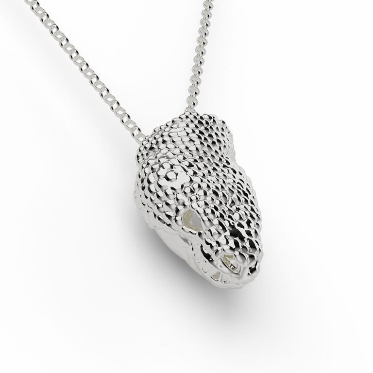 sterling silver Gila monster skull necklace, side view, on a sterling silver chain