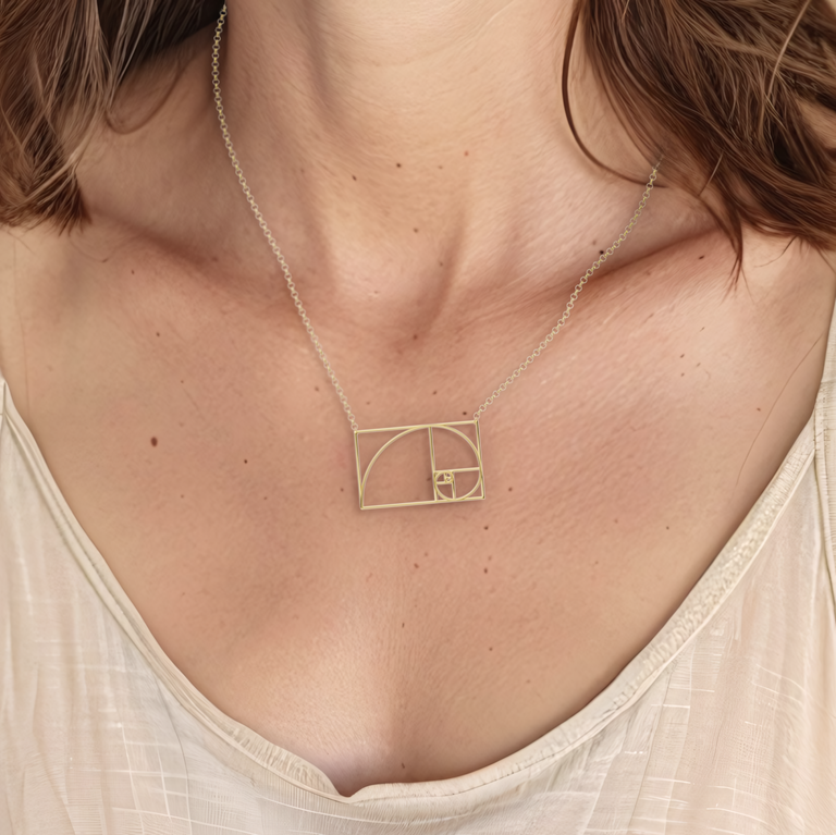 Close-up of the Golden Ratio Necklace in gold vermeil, highlighting its unique geometric design and connection to the beauty of the Golden Ratio.