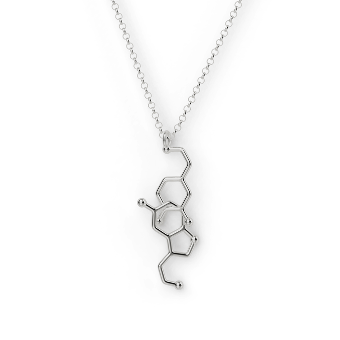 Silver dopamine and serotonin necklace showcasing neurotransmitter designs, perfect for science lovers.